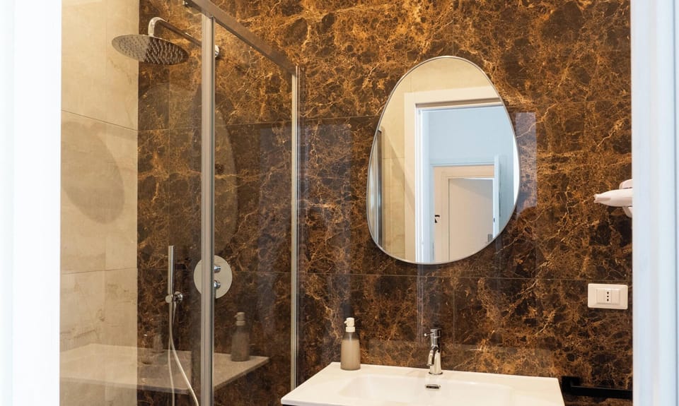 Double Room | Bathroom | Shower, hair dryer, towels, soap