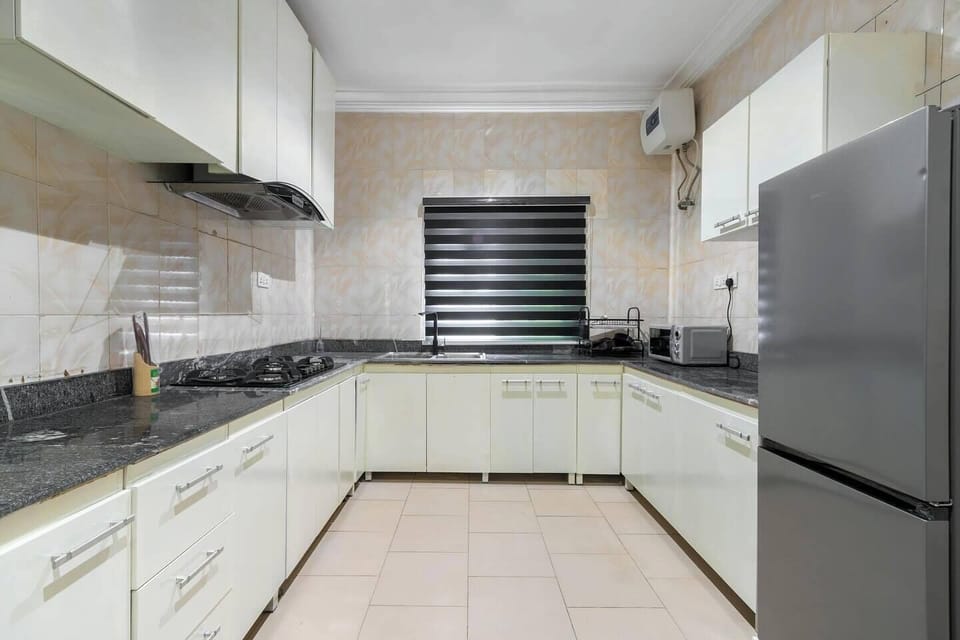 Economy Apartment, Balcony, City View | Private kitchen | Fridge, microwave, oven, stovetop