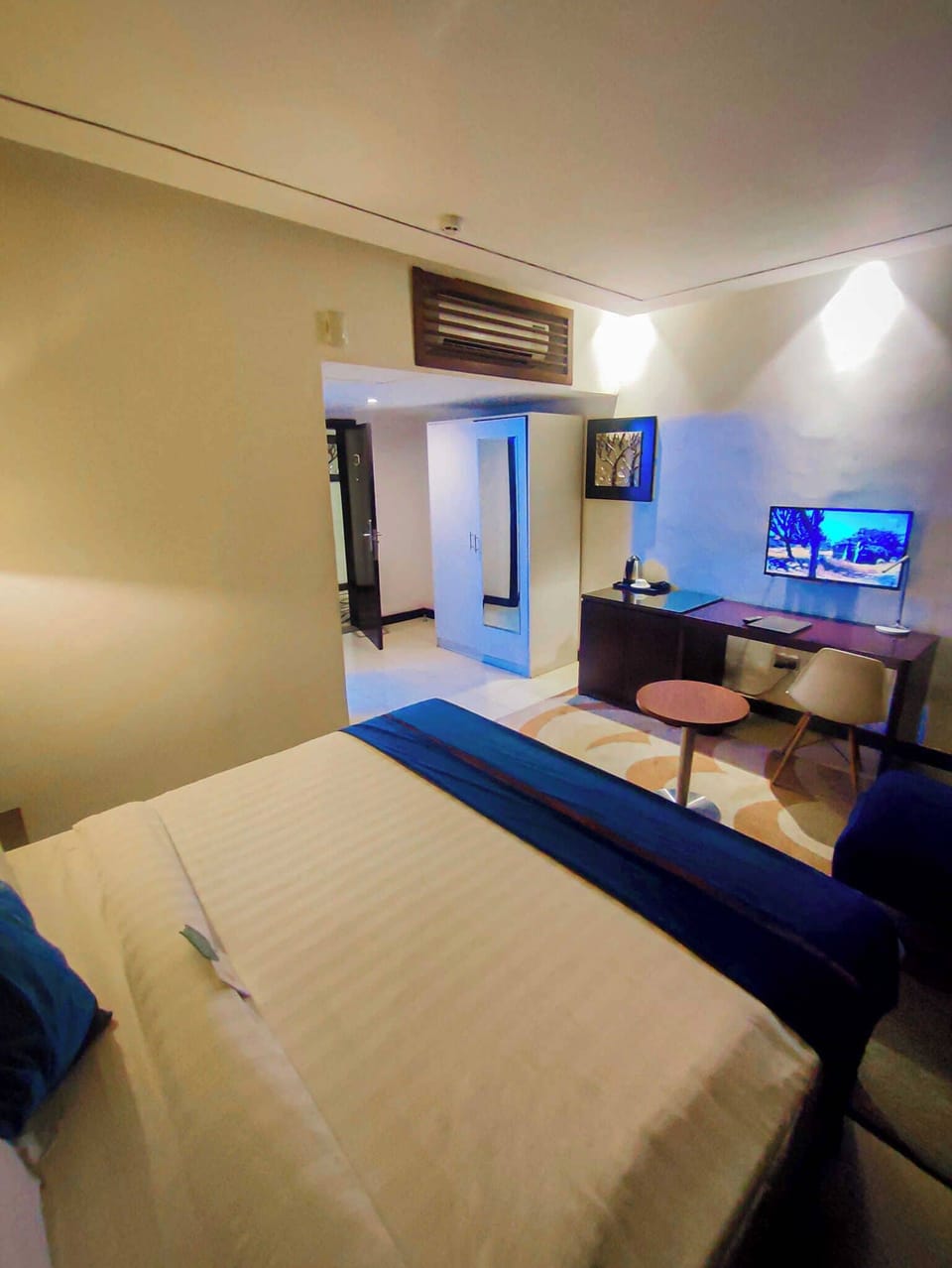 Deluxe Room, Balcony, City View | Desk, laptop workspace, blackout drapes, soundproofing