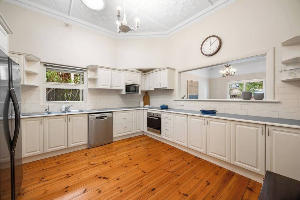 Cook with ease in the oversized kitchen, where expansive bench space and modern appliances make everything from quick breakfasts to shared family dinners feel effortless.