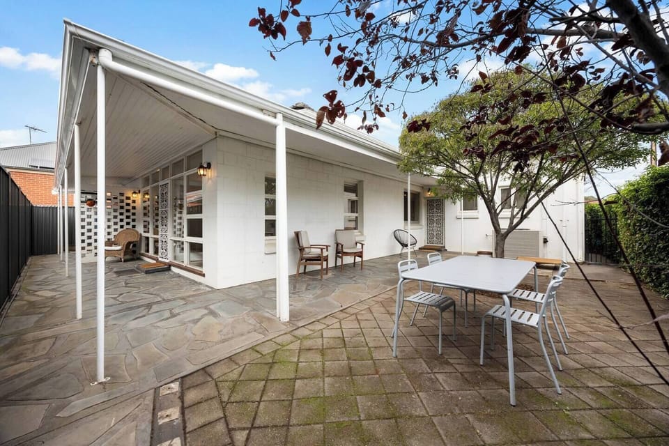 Spend warm afternoons dining outdoors on the private patio while the pets roam freely in the fully fenced courtyard.