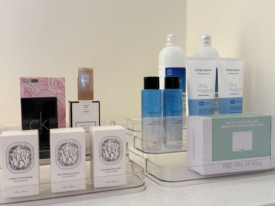 Hair dryer, towels, soap, shampoo