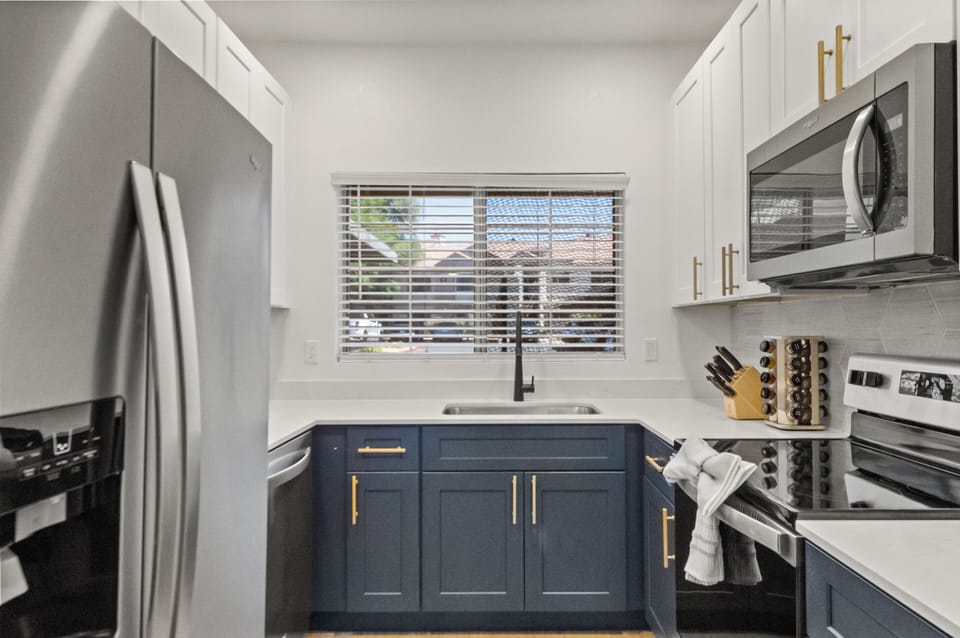 Spacious countertops provide plenty of room for meal preparation at this kitchen