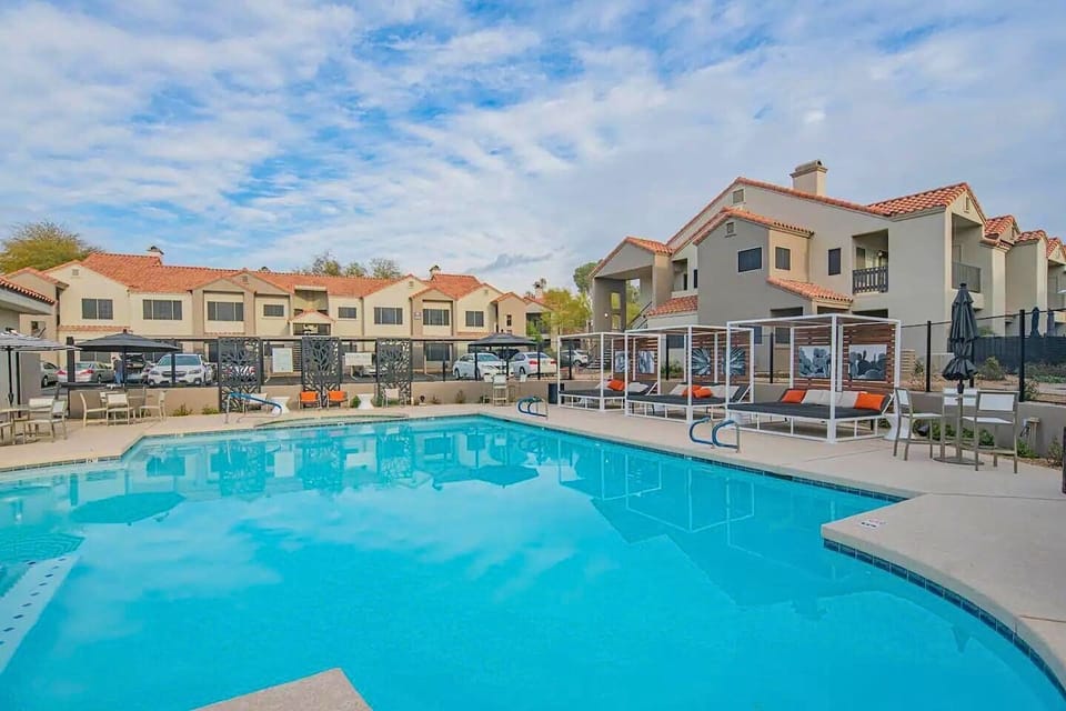 Sunny poolside escape with resort-style living.