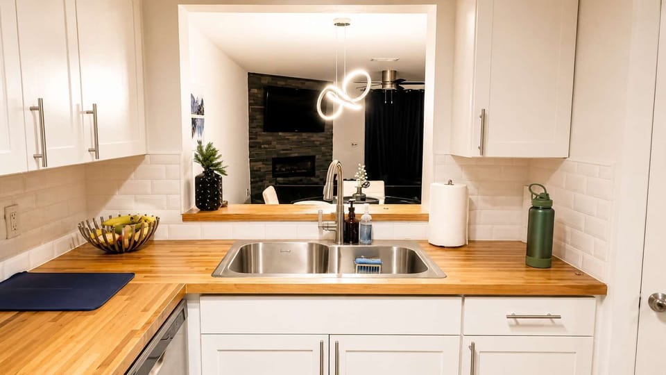 Kitchen: Modern finishes and cozy vibes, perfect for whipping up delicious meals during your stay!