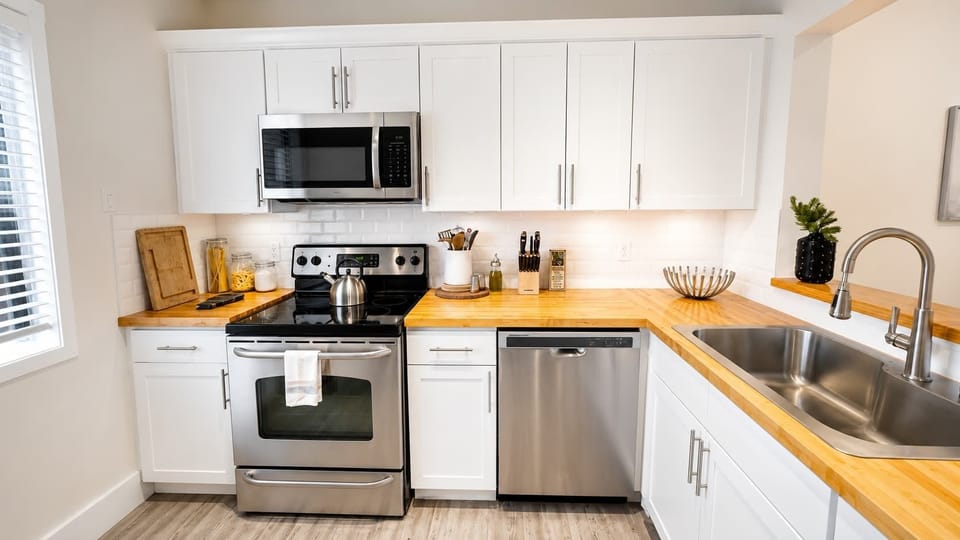 Gourmet Kitchen: Cook delicious meals in this stylish, well-equipped kitchen with modern appliances!
