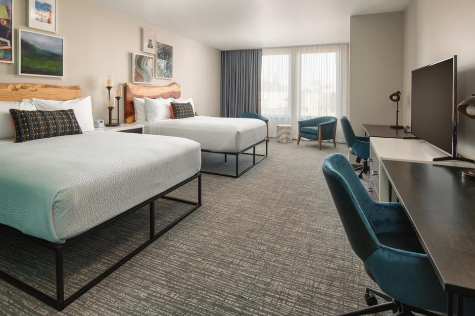 Spread out comfortably in a spacious double-queen retreat.