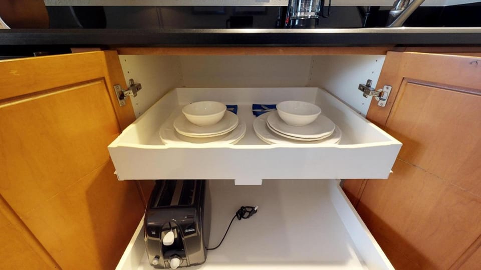 Enjoy quick coffee breaks at the convenient in-suite kitchenette.