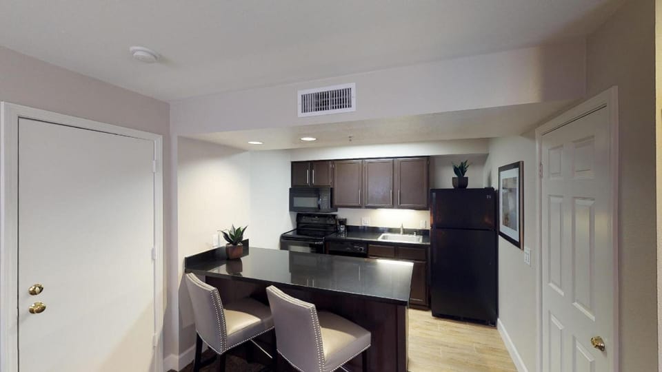 Cook with ease in a modern kitchen and breakfast bar.