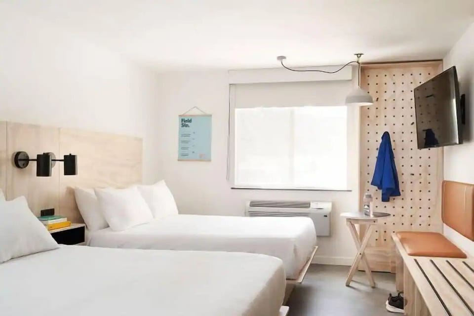 Settle into crisp linens and unwind in airy comfort.