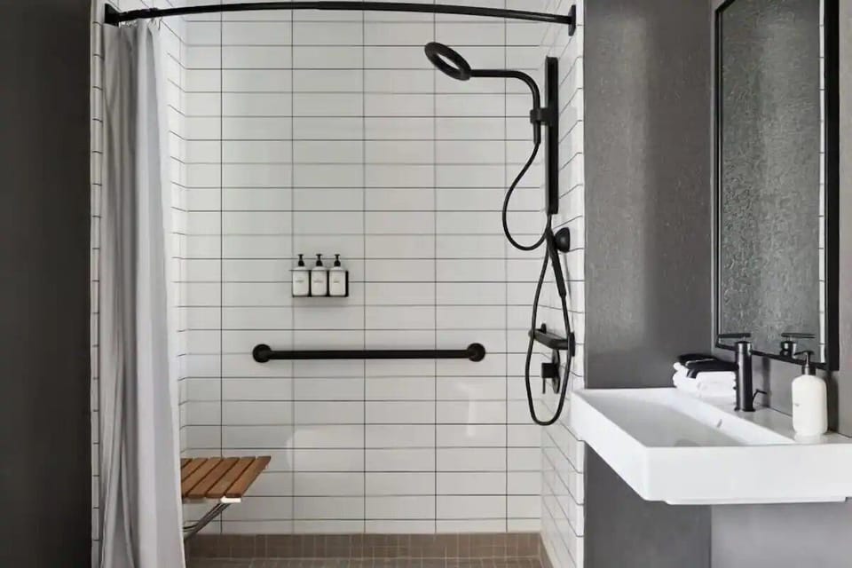 Start the day in a sleek bath with generous counter space.