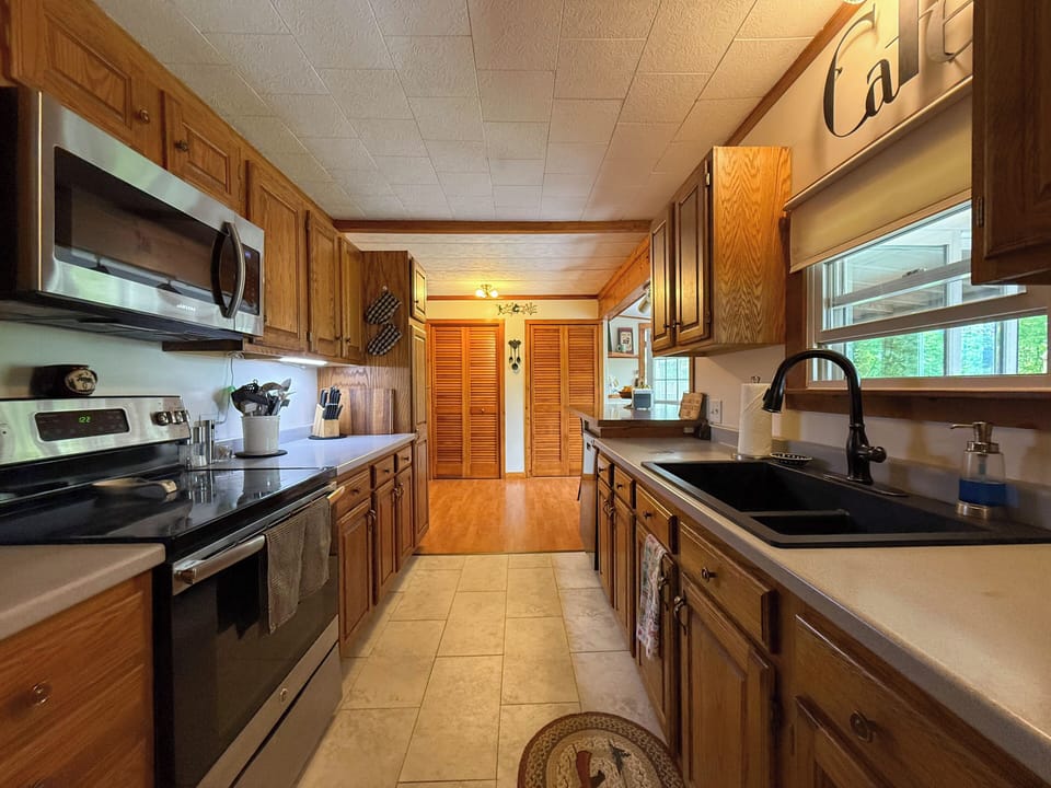 Fully equipped kitchen with mountain views from kitchen window