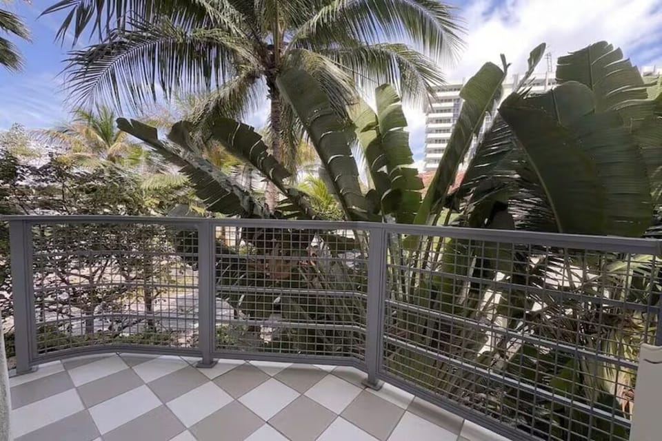Sip morning coffee on the balcony amid palm breezes.