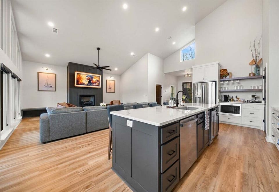 The open-concept design allows the kitchen and living areas to flow effortlessly together, making it easy to host or simply enjoy time with family.