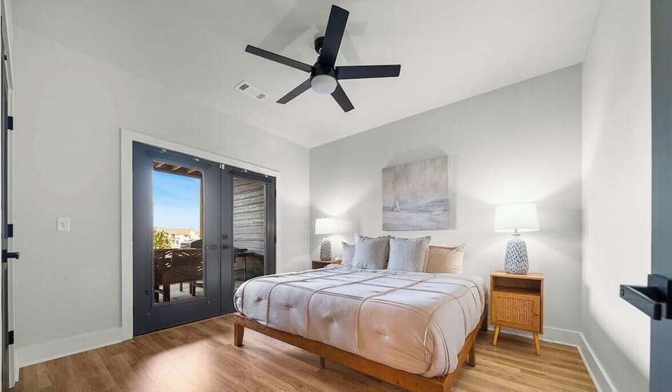 The fifth king bedroom provides generous space, soft lighting, and a calm atmosphere perfect for restful nights.
