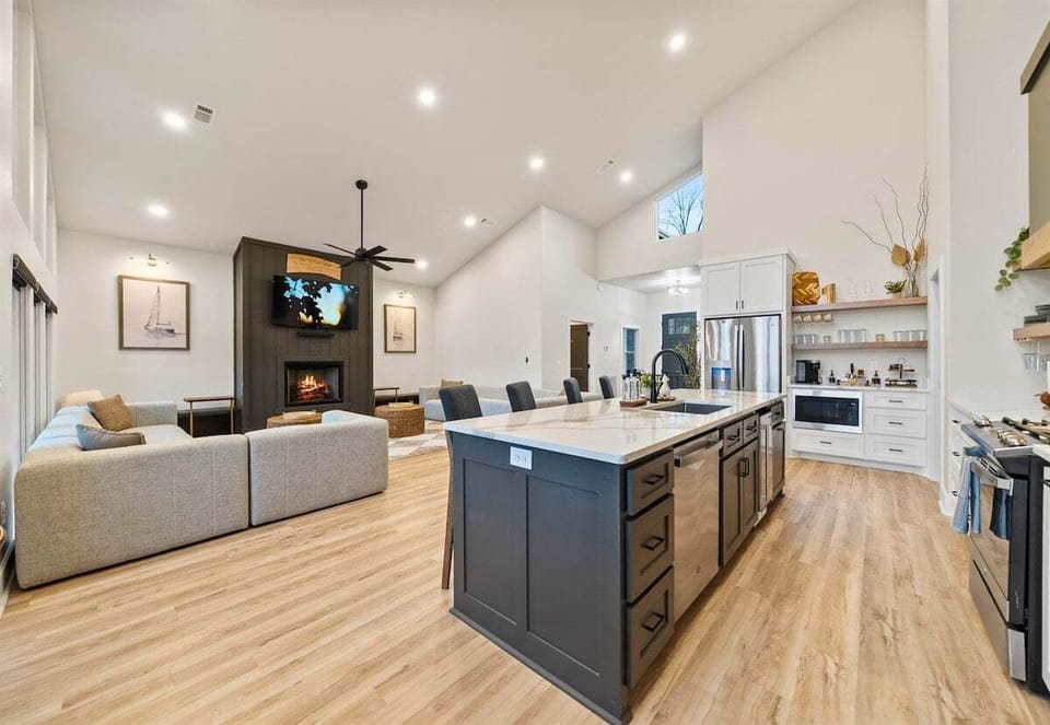 The open-concept design allows the kitchen and living areas to flow effortlessly together, making it easy to host or simply enjoy time with family.