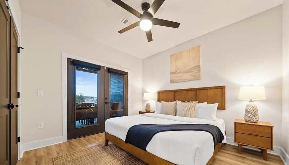 The fifth king bedroom provides generous space, soft lighting, and a calm atmosphere perfect for restful nights.