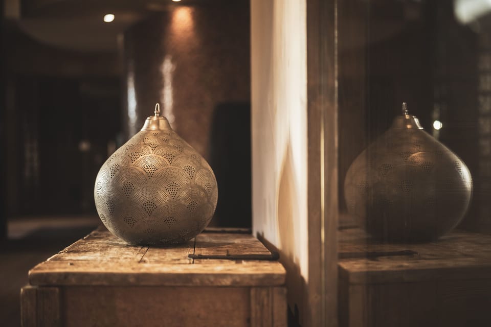 Warm-toned Kashmir décor fills the communal areas, with carved wood and rich fabrics throughout.