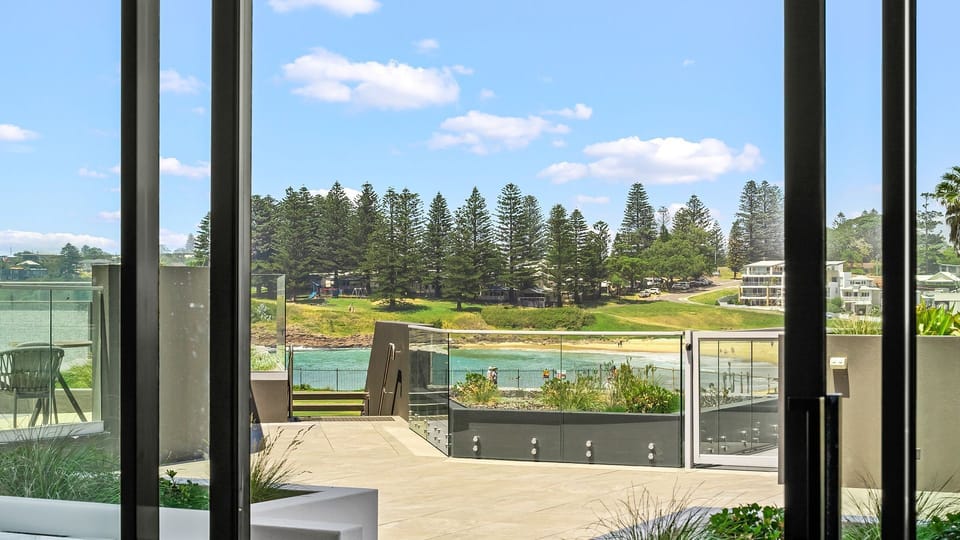 View from loungeroom of pool area looking onto Surf Beach
