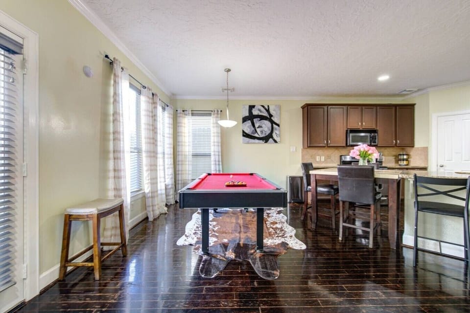 Enjoy an 8-ball pool table for fun and entertainment.