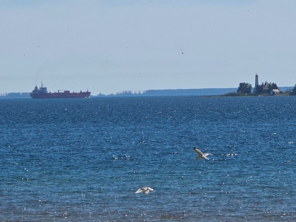 Catch a freighter off the easterly point of St. Helena Island, heading west to Duluth, etc. or south towards Chicago.