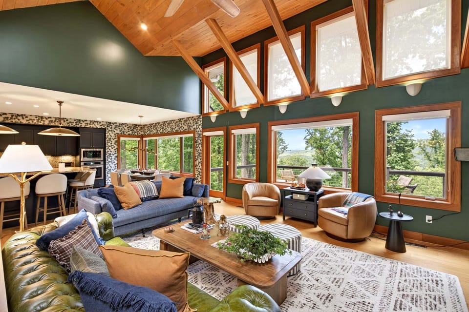 Living room with TV for streaming, gas fireplace, and record player turned Bluetooth speaker