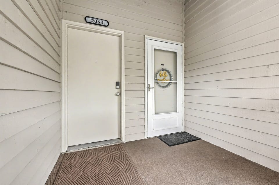 Welcome to 2064 Long Bend Drive, featuring a charming entryway with keyless smart-lock access for a seamless check-in experience.