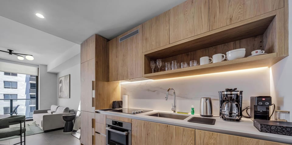 Condo, Balcony, City View | Private kitchen | Fridge, microwave, stovetop, dishwasher