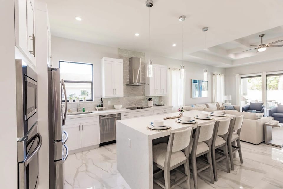Expansive counter space and premium seating for casual morning coffee or meal prep.