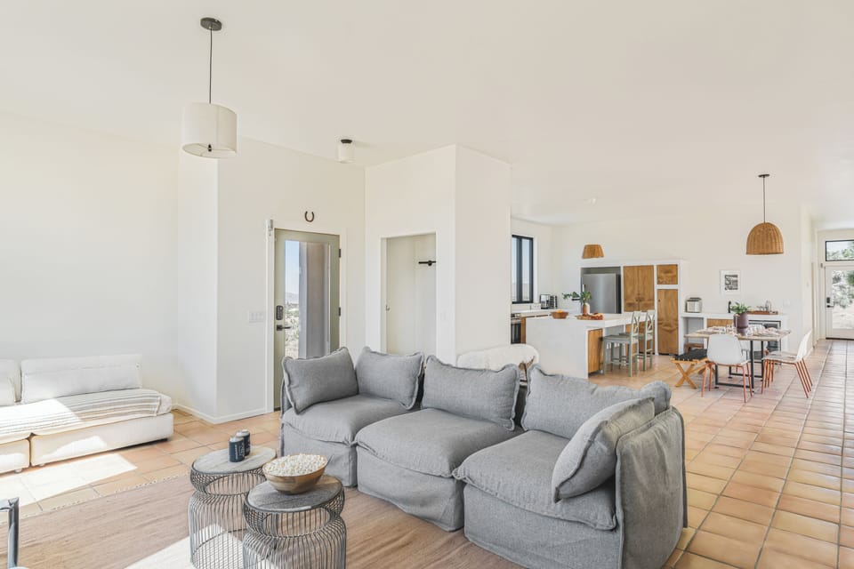The open layout ensures you’re never far from the action, whether in the kitchen or the lounge.