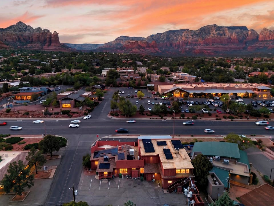 Wake up to iconic Sedona red rock views and vibrant desert sunsets right in the heart of town.