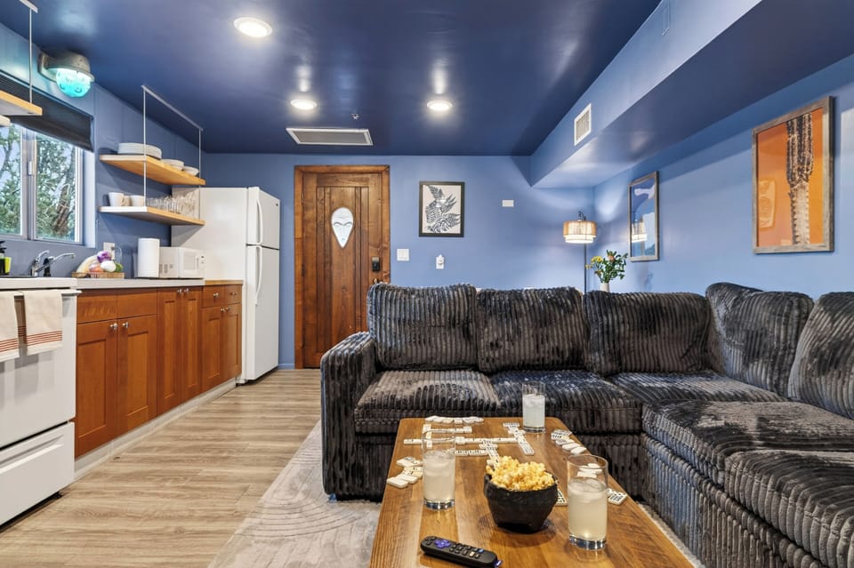 Stretch out on the oversized full-size sleeper sofa in this cozy lounge space, complete with a kitchenette and room for movie nights or extra guests. (Canyon Drift)