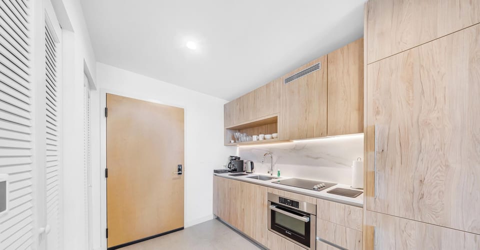 Condo, Balcony, City View | Private kitchen | Fridge, microwave, stovetop, dishwasher