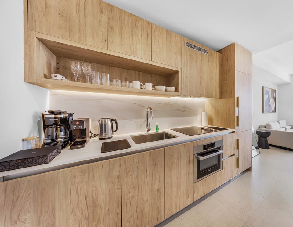 Condo, Balcony, City View | Private kitchen | Fridge, microwave, stovetop, dishwasher