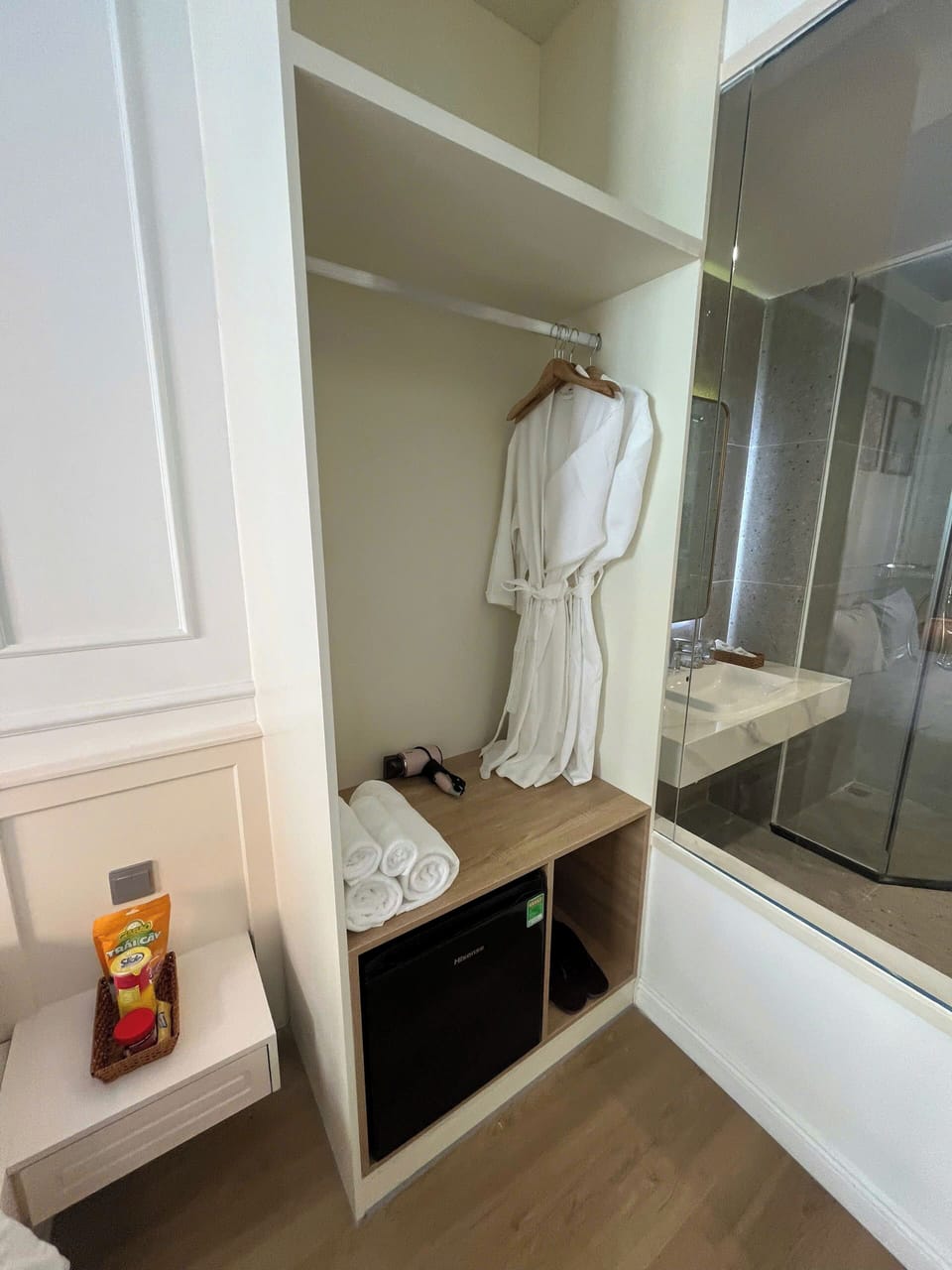 Shower, hair dryer, slippers, towels