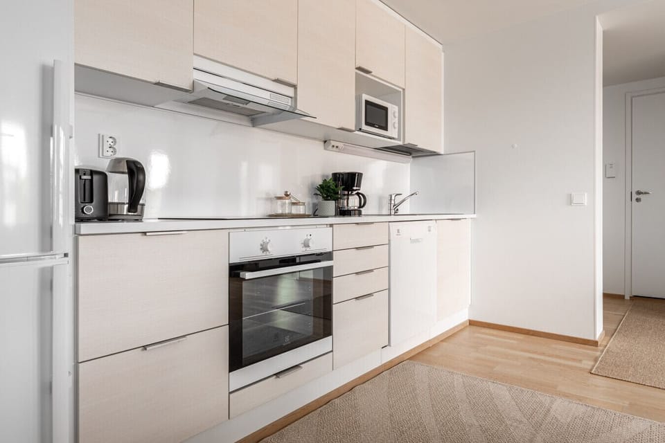 Cook your favorite recipes effortlessly with a modern oven, induction stovetop, and a variety of essential kitchen utensils. A built-in dishwasher is ready to handle the cleanup so you can spend more time exploring.