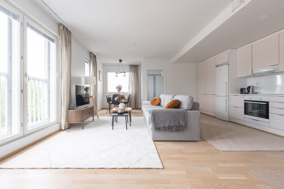 Experience true Scandinavian design with an open-concept layout that maximizes space and lets natural light reach every corner. The seamless transition between the kitchen, dining, and living areas makes the apartment feel exceptionally roomy.