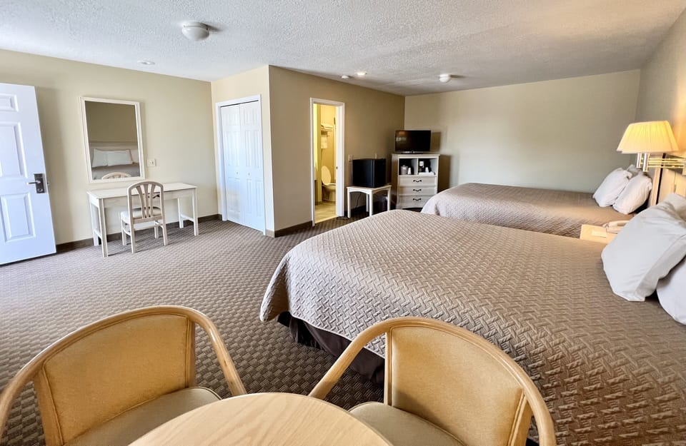 Deluxe Room, 2 Queen Beds, Patio, Courtyard Area | Premium bedding, desk, iron/ironing board, free WiFi