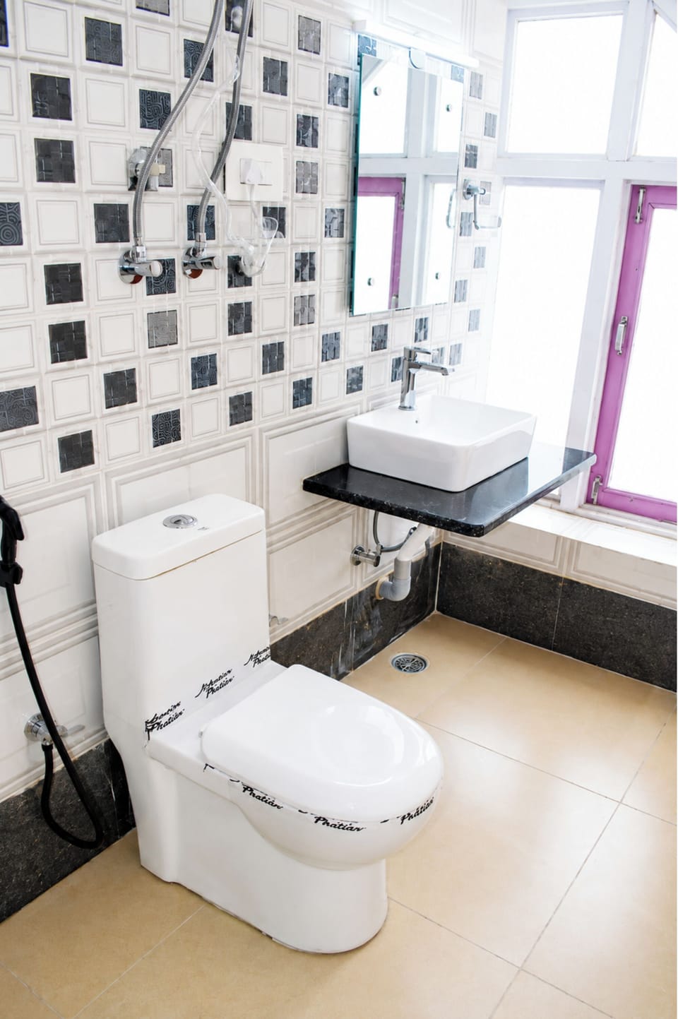 Shower, rainfall showerhead, slippers, towels