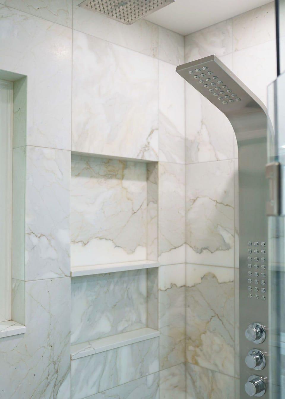 Standing shower in bathroom upstairs.