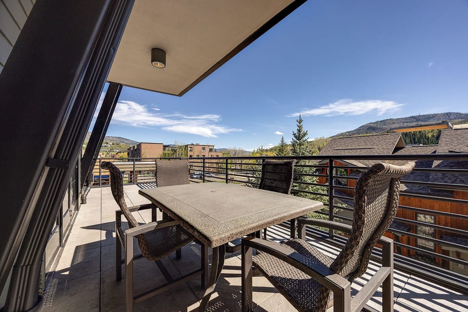 A private balcony with mountain views, perfect for your morning coffee or evening relaxation in the fresh mountain air.