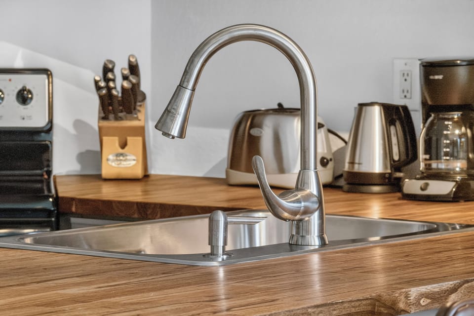 Your fully-equipped kitchen features modern appliances and tools for preparing meals at your own pace, from morning coffee to home-cooked dinners.