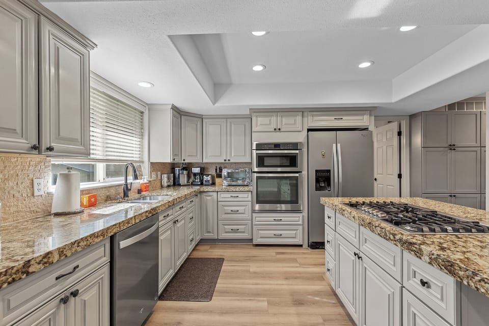 Whip up your favorite meals in this beautifully designed kitchen.