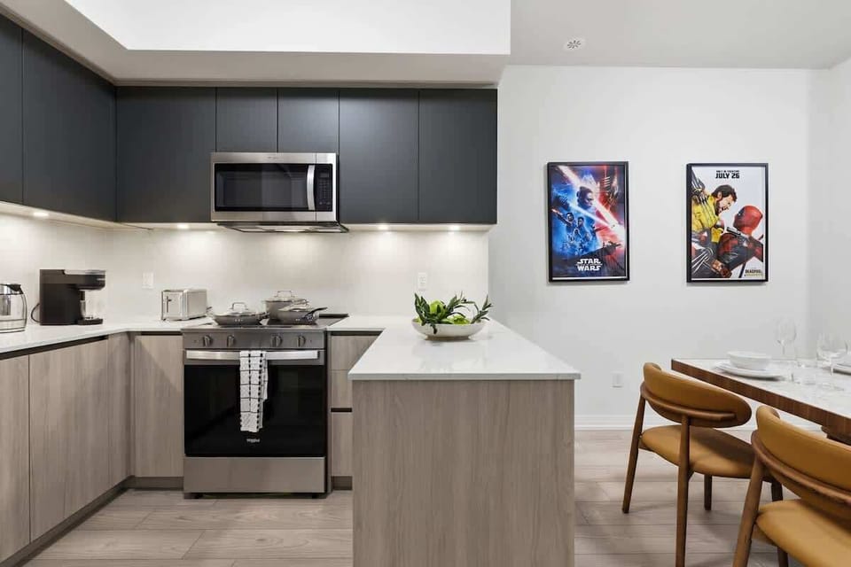 Modern kitchen with stainless steel appliances and sleek finishes