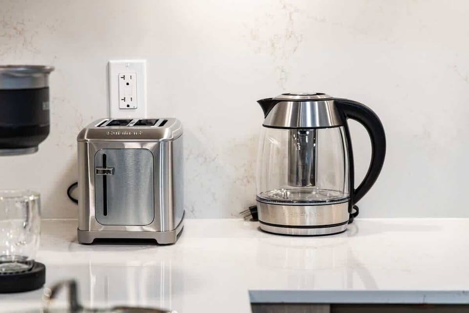 Modern kitchen with stainless steel appliances and sleek finishes