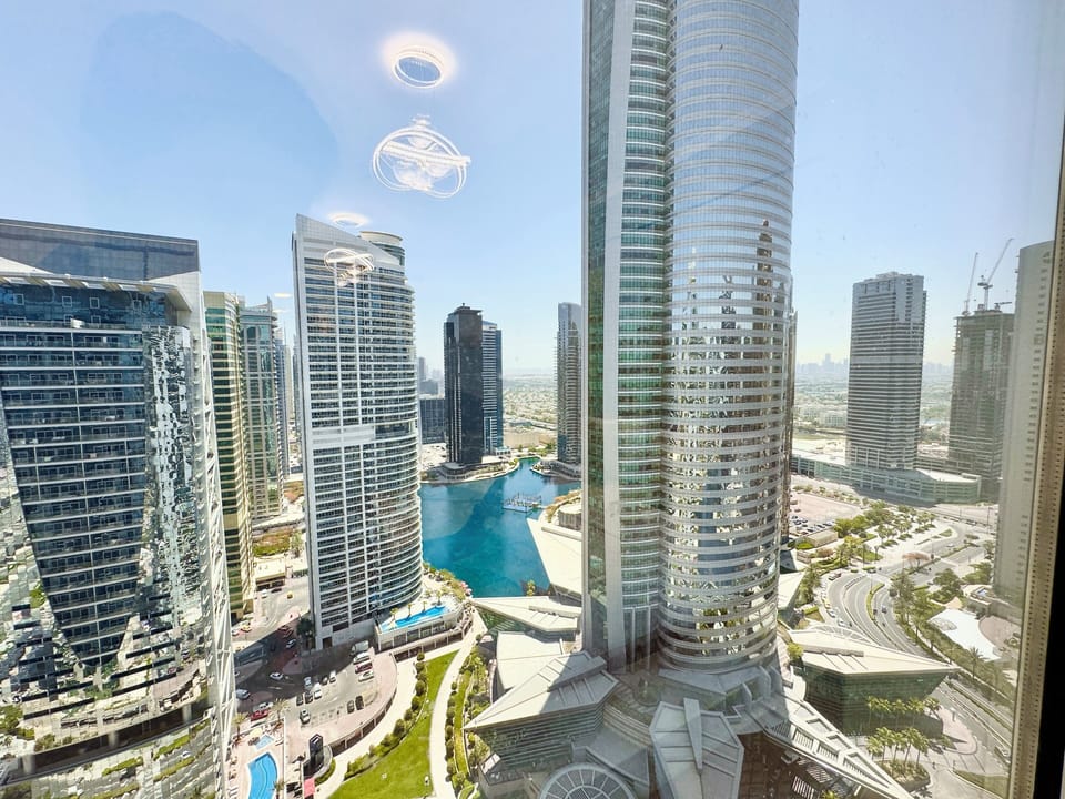 Luxury Apartment, Lake View | In-room safe, blackout drapes, iron/ironing board, free WiFi