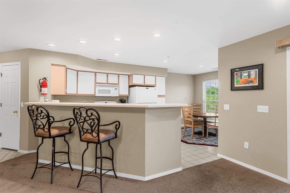 The open kitchen offers ample space & all the comforts of home​