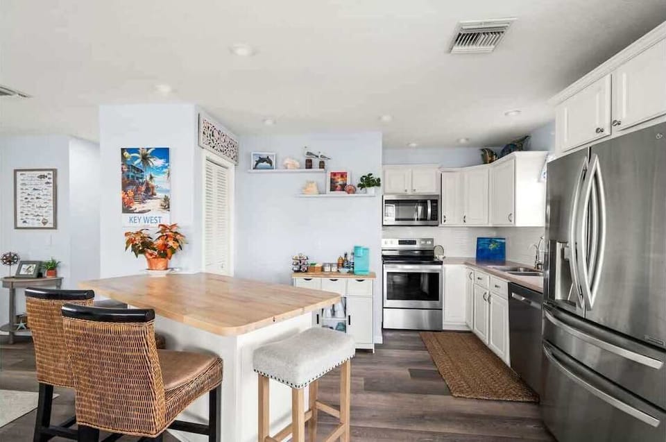 Spacious kitchen with island seating built for family meals and gatherings.