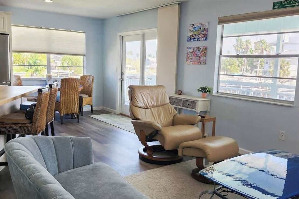 Open concept living area connecting kitchen and lounge for easy group flow.