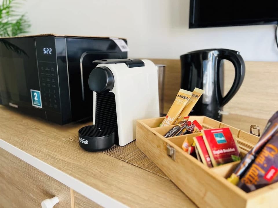 Morning Essentials: Start your day right with a coffee from the in-room Nespresso machine and enjoy your favorite brew.
